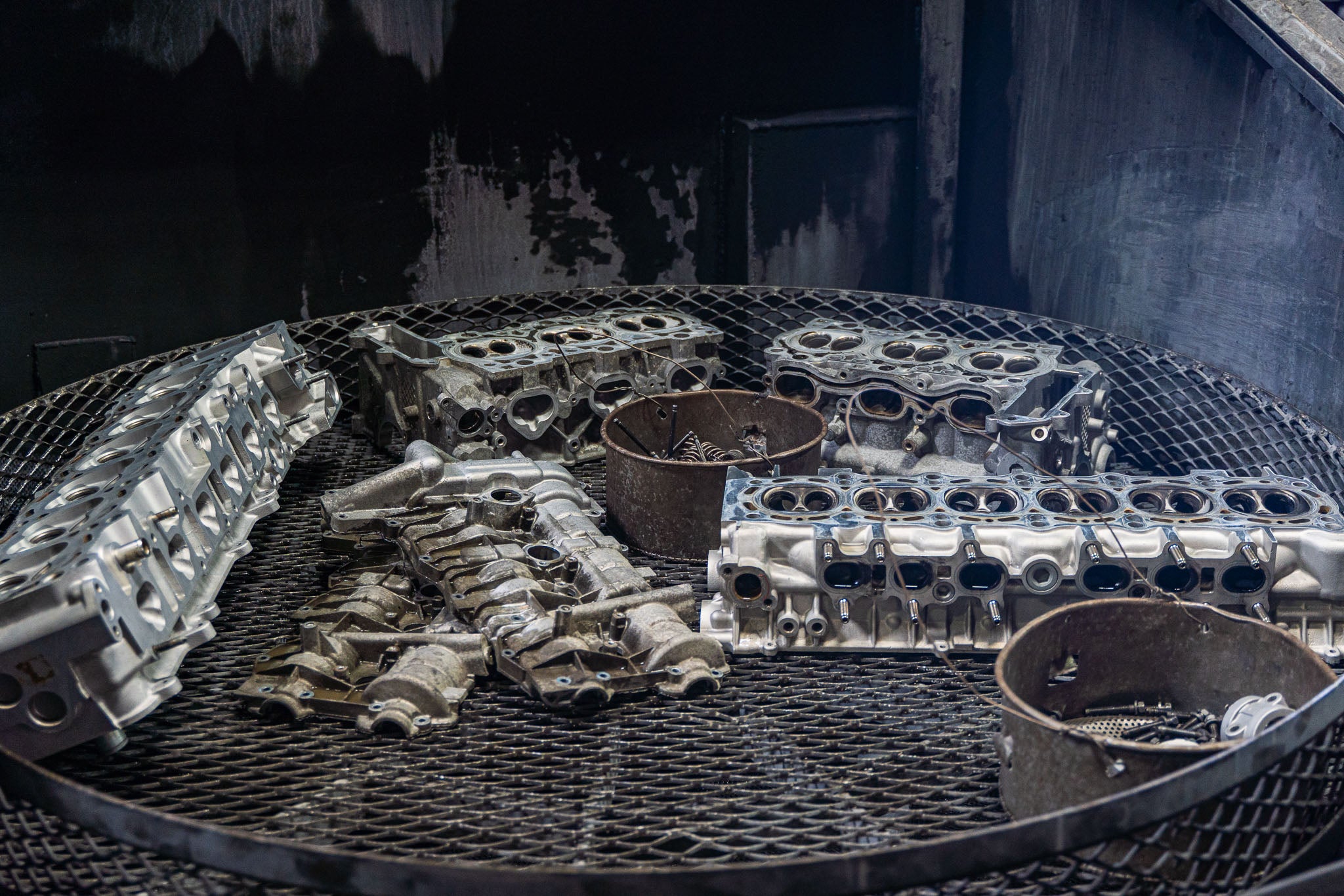 Engine parts being washed or cleaned