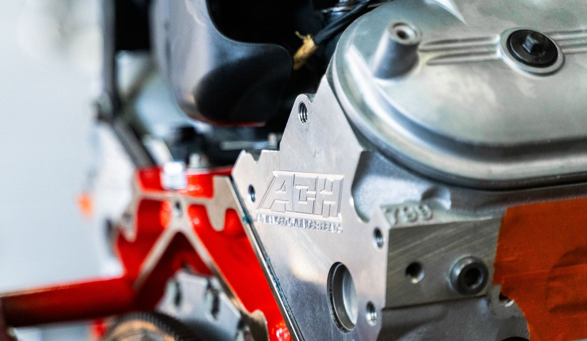 Closeup photo of engine with ACH logo on cylinder head